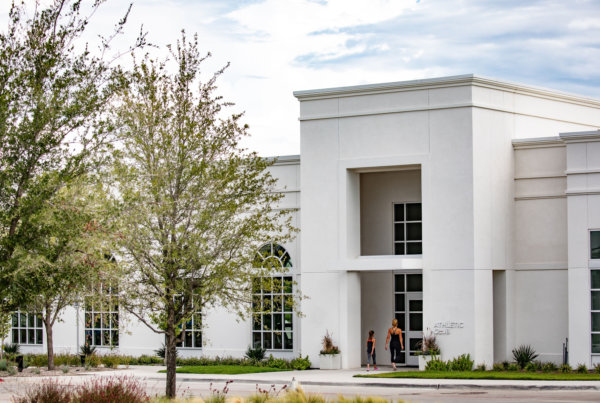 Mom and daughter walk into the Walsh Athletic Club