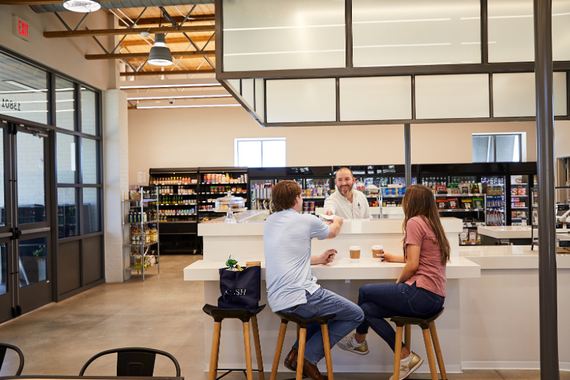 Couple enjoying coffee at the Village Market