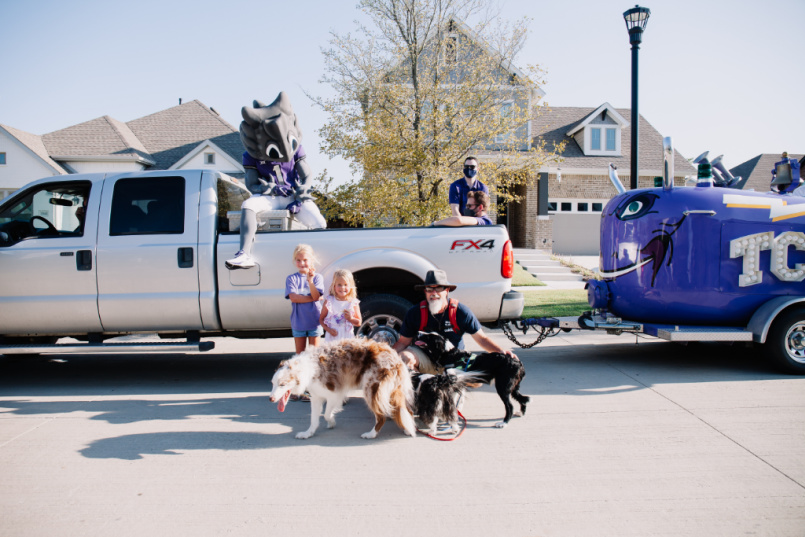 Neighbors pose during drive-by