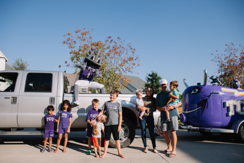 Neighbors pose with Superfrog