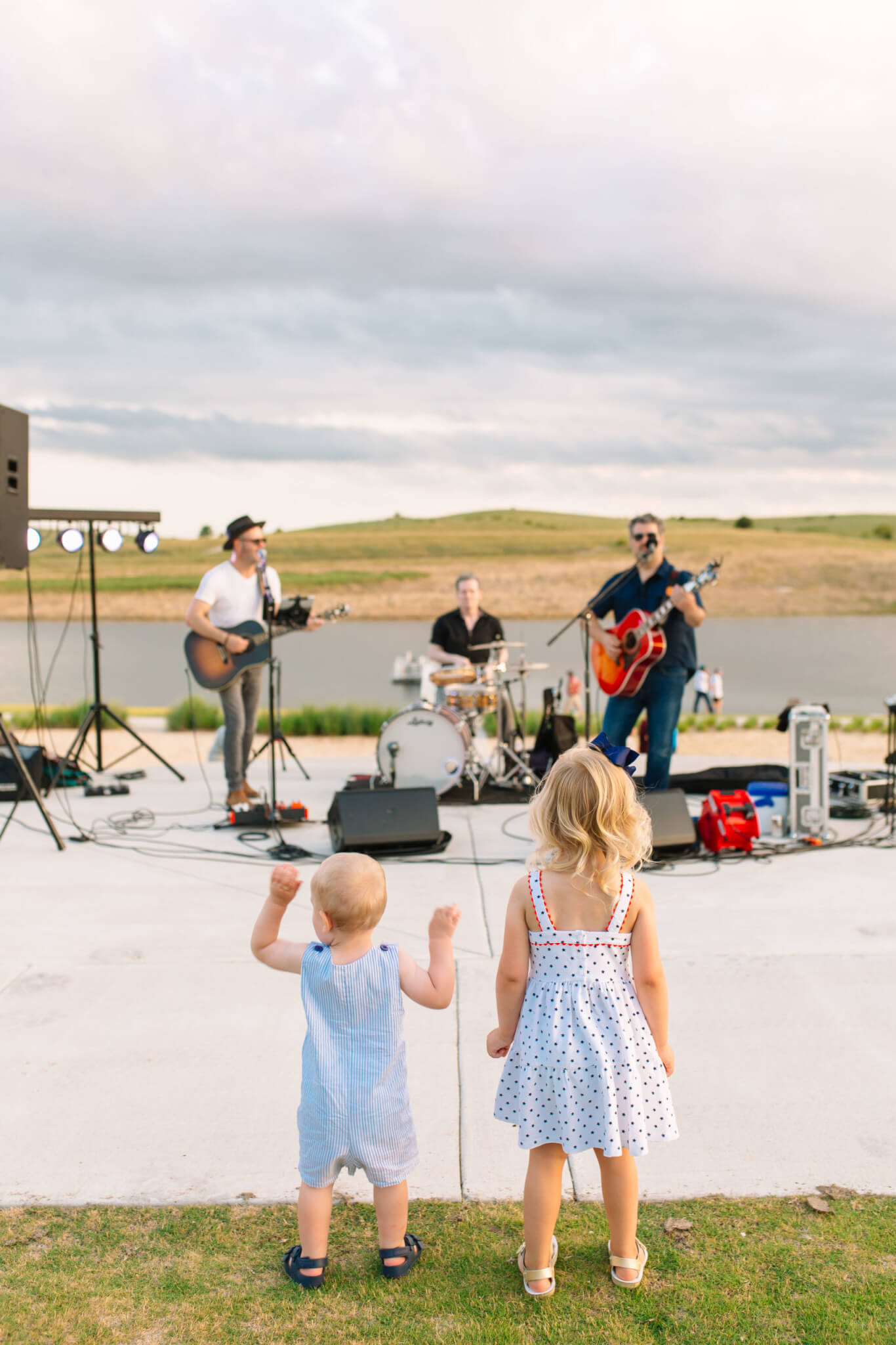 Children enjoying music from Jon Christopher Davis at the Star Spangled Celebration in Lake Park.