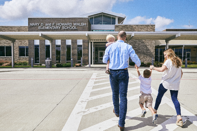 The Wallaces are looking forward to their sons attending Walsh Elementary.