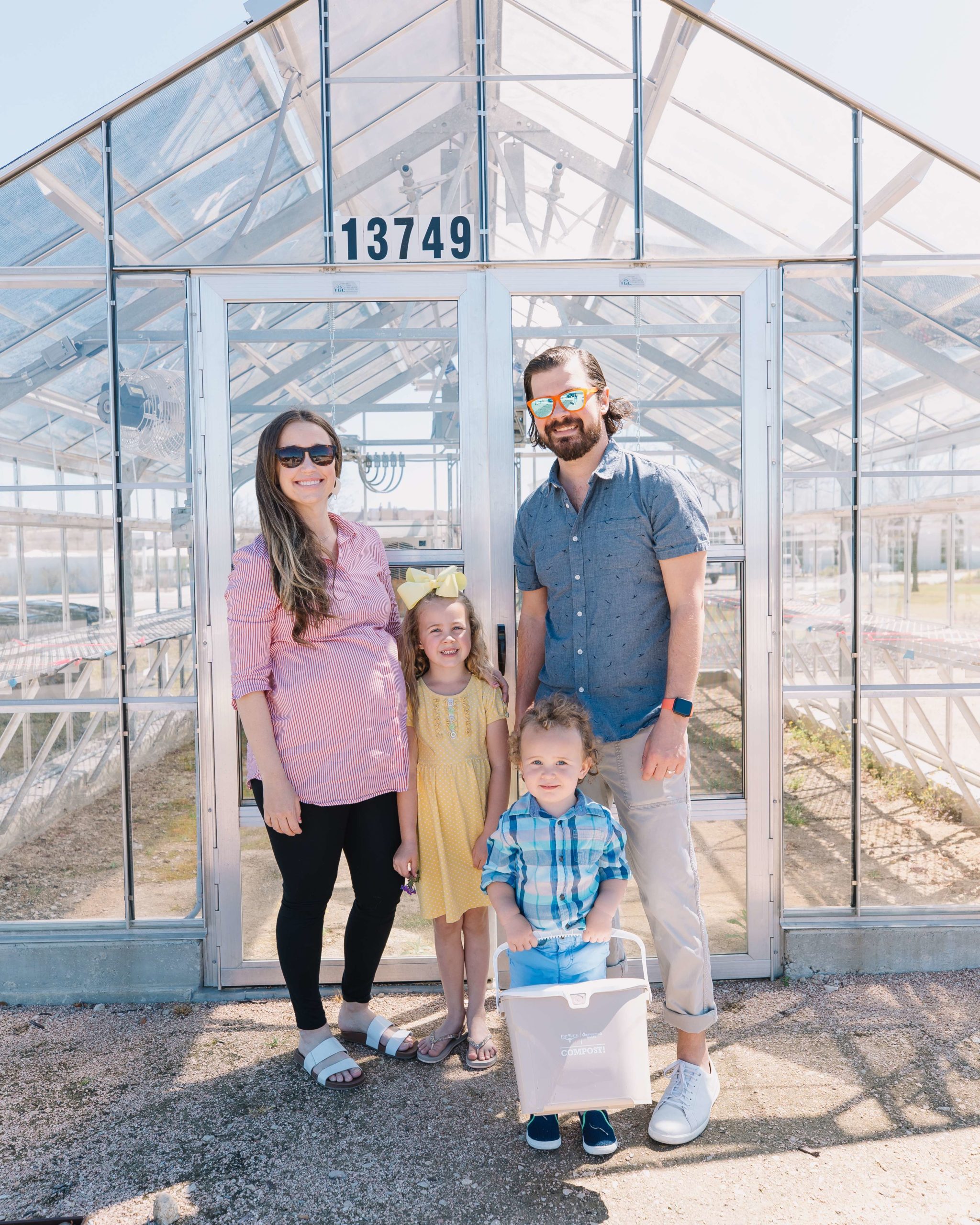 Stacy Barton and family outside the composting collection site
